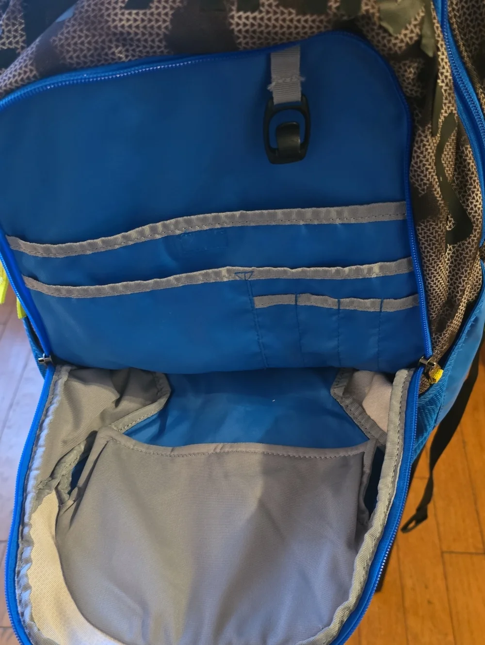 Under Armour Blue and Black Camo  Backpack with Neon Accents